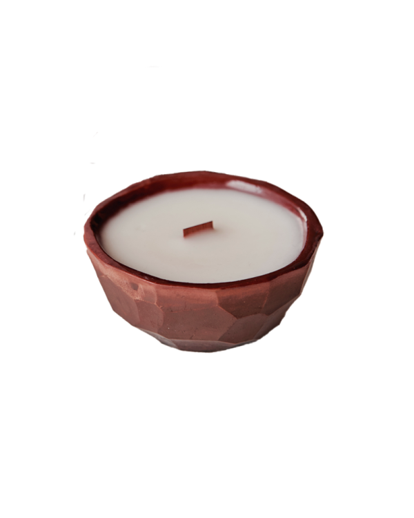 Scented candle in ceramic shell